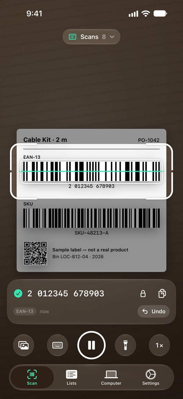 The Scan tab of Barcoder for iPhone over a demo product label: its product barcode sits in the viewfinder, and the card below shows the scan just added, 2 012345 678903.